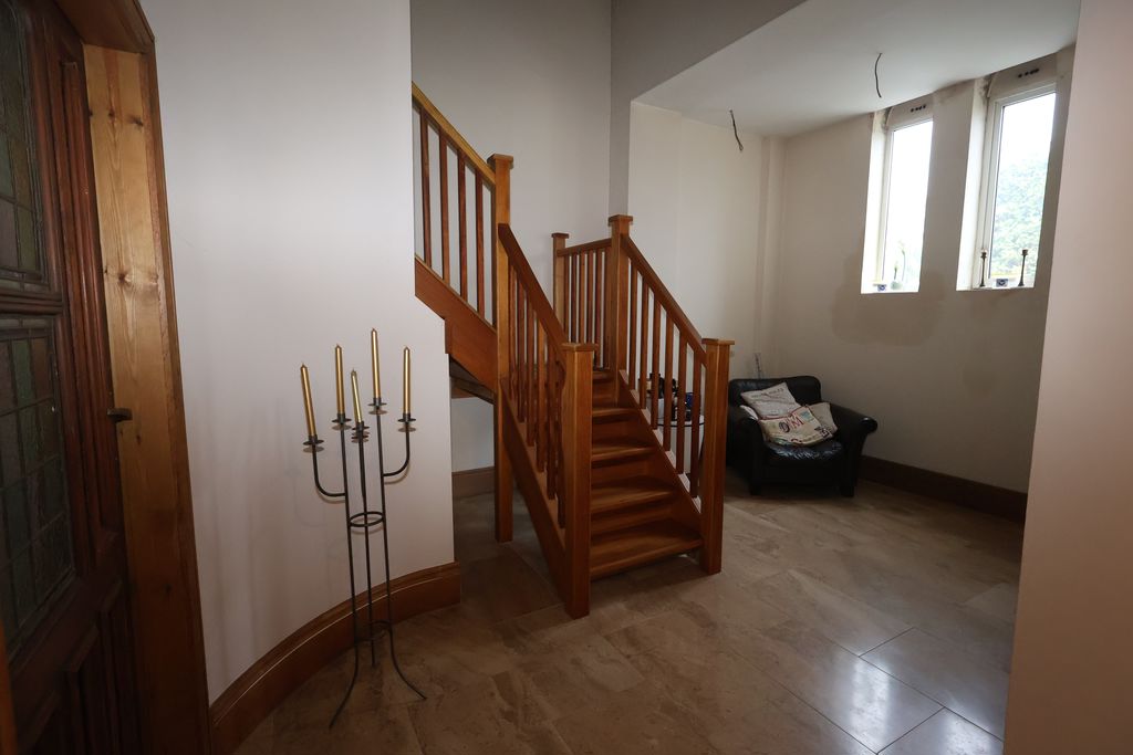 Lobby with Stairs to Study- click for photo gallery